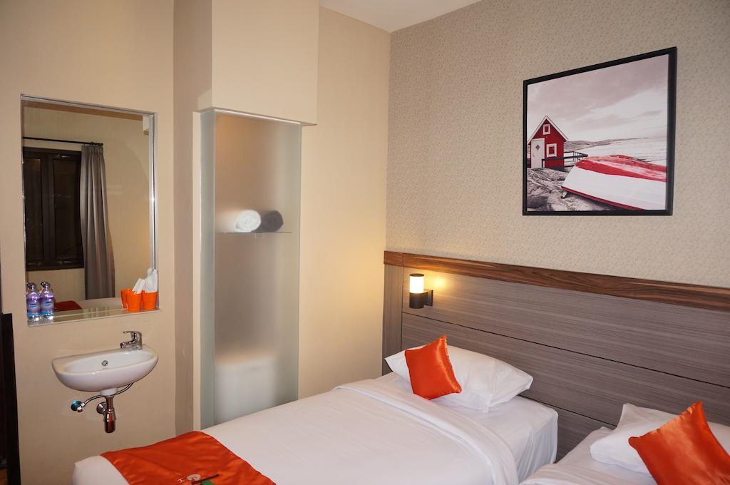 Ekon Hotel Джокякарта Стая снимка