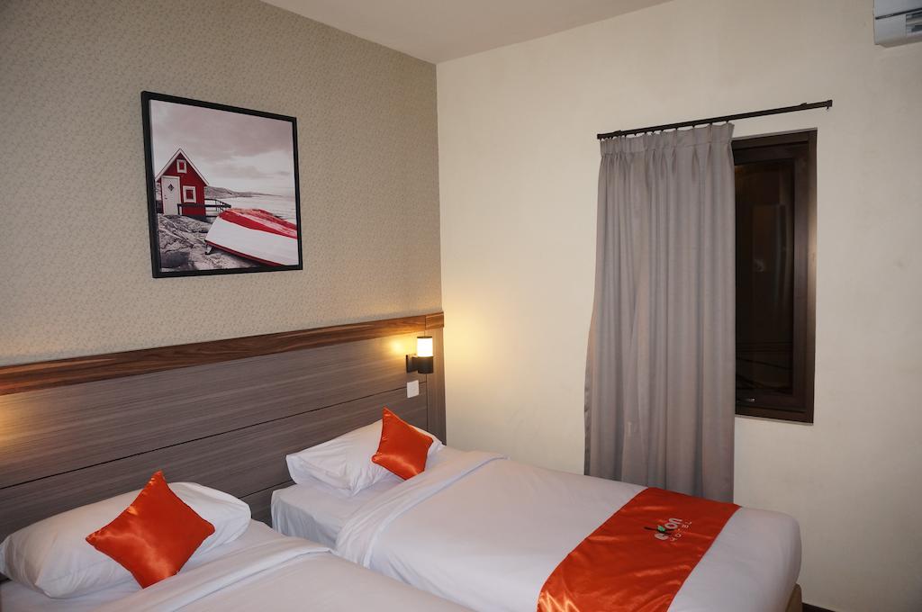 Ekon Hotel Джокякарта Стая снимка