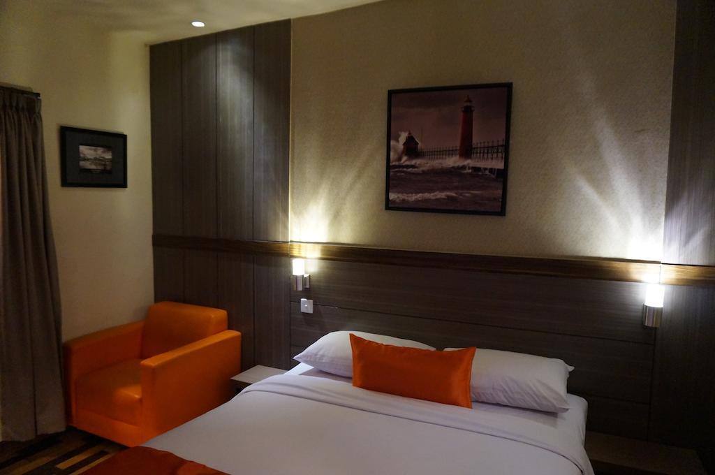Ekon Hotel Джокякарта Стая снимка